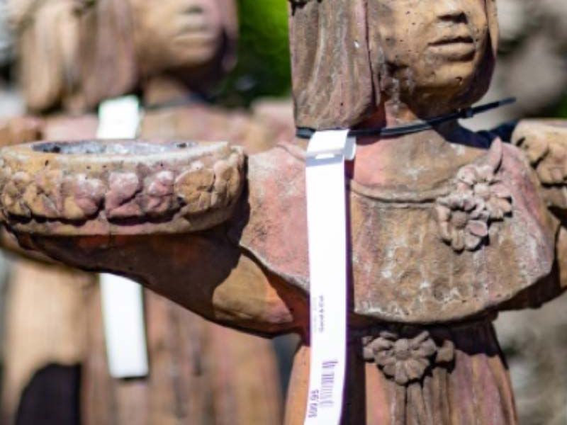 Rustic gadern statue for adding special accents.